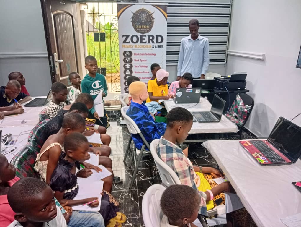 Participants learning together at laptops inside the ZOERD hub